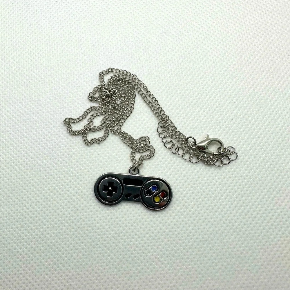 Video game‎ controller retro pendant​​​ 🦕